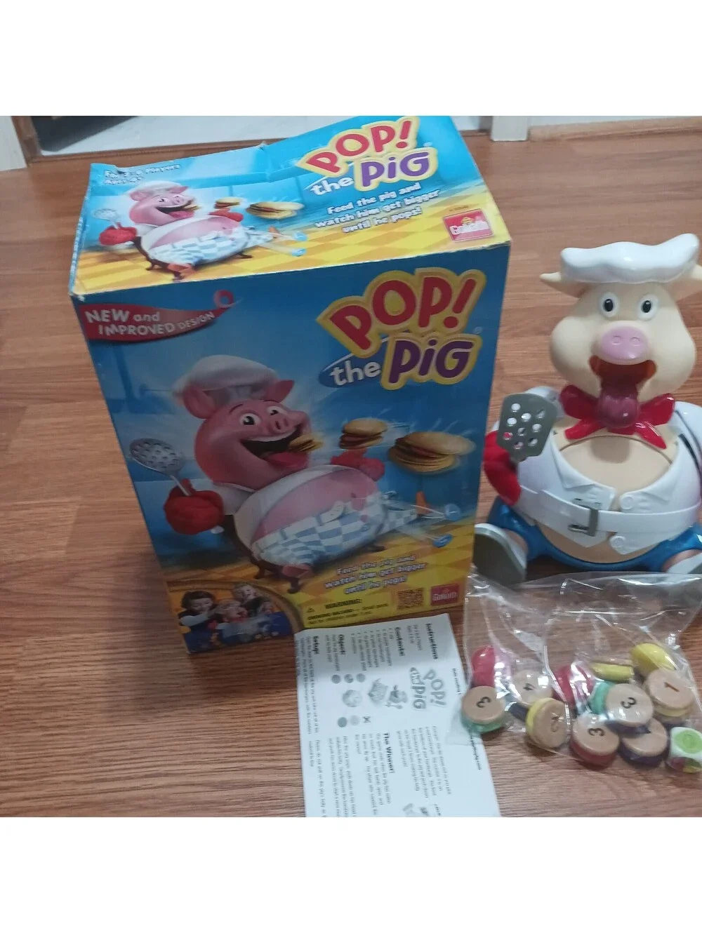 Pop! The  Pig Toy Game  and Accessories Feed the Pig Watch  him get  Bigger